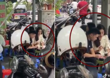 Hoa hậu Đỗ Mỹ Linh và Đỗ Vinh Quang giản dị ngồi ăn lề đường cùng nhau